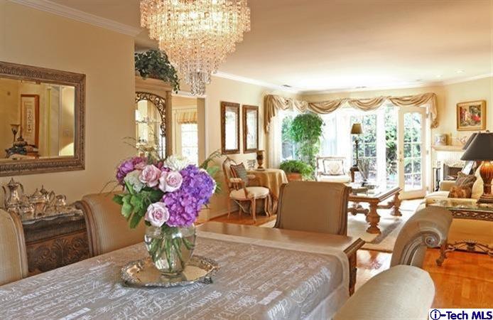 225 West Kenneth Road Glendale, CA 91202 - Photo 8 of 31 a living room with furniture or couch and a chandelier