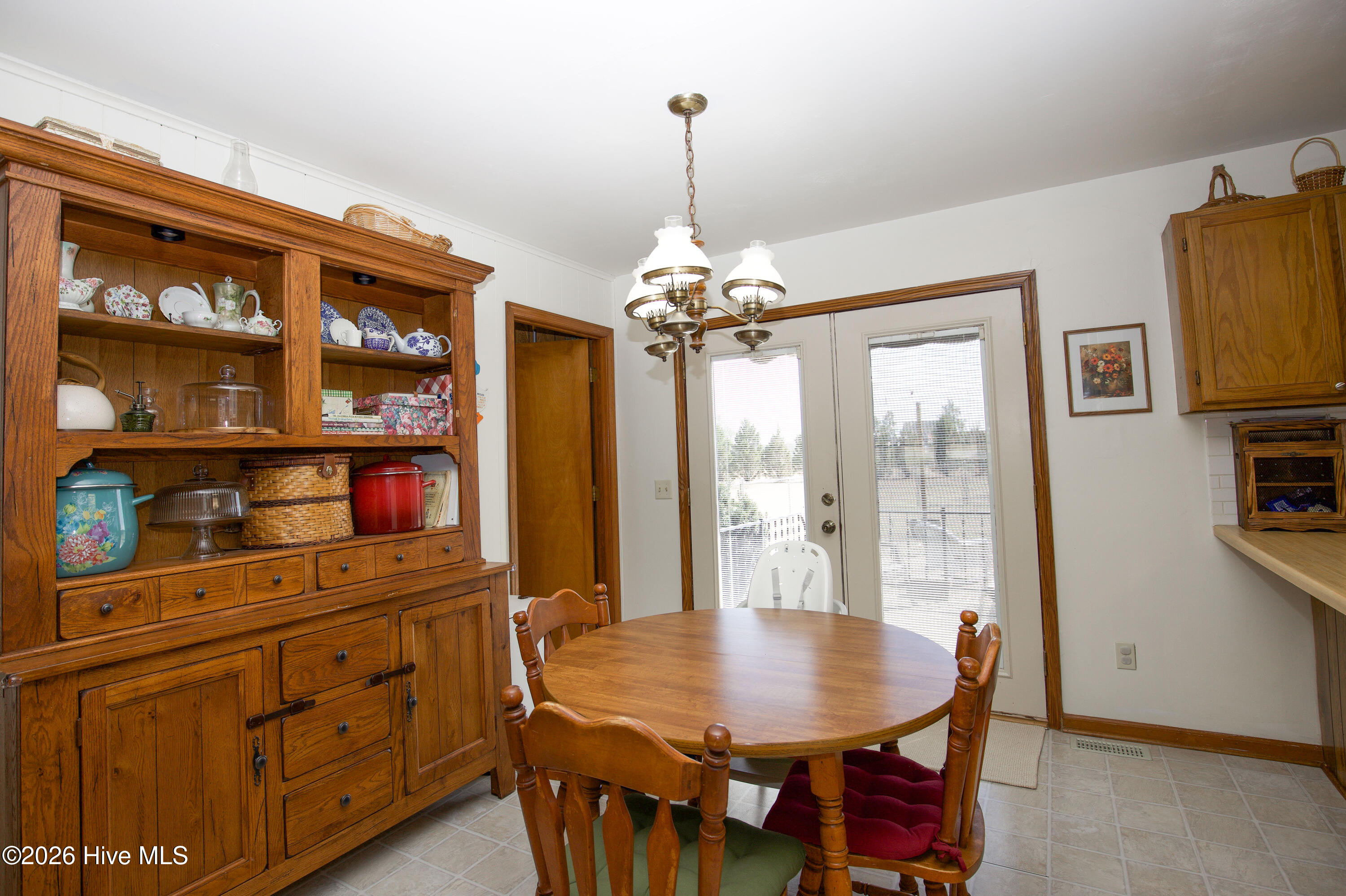 124 Joseph Road Aberdeen, NC 28315 - Photo 16 of 59 Dining area with natural light and convenient access to kitchen and living spaces.
