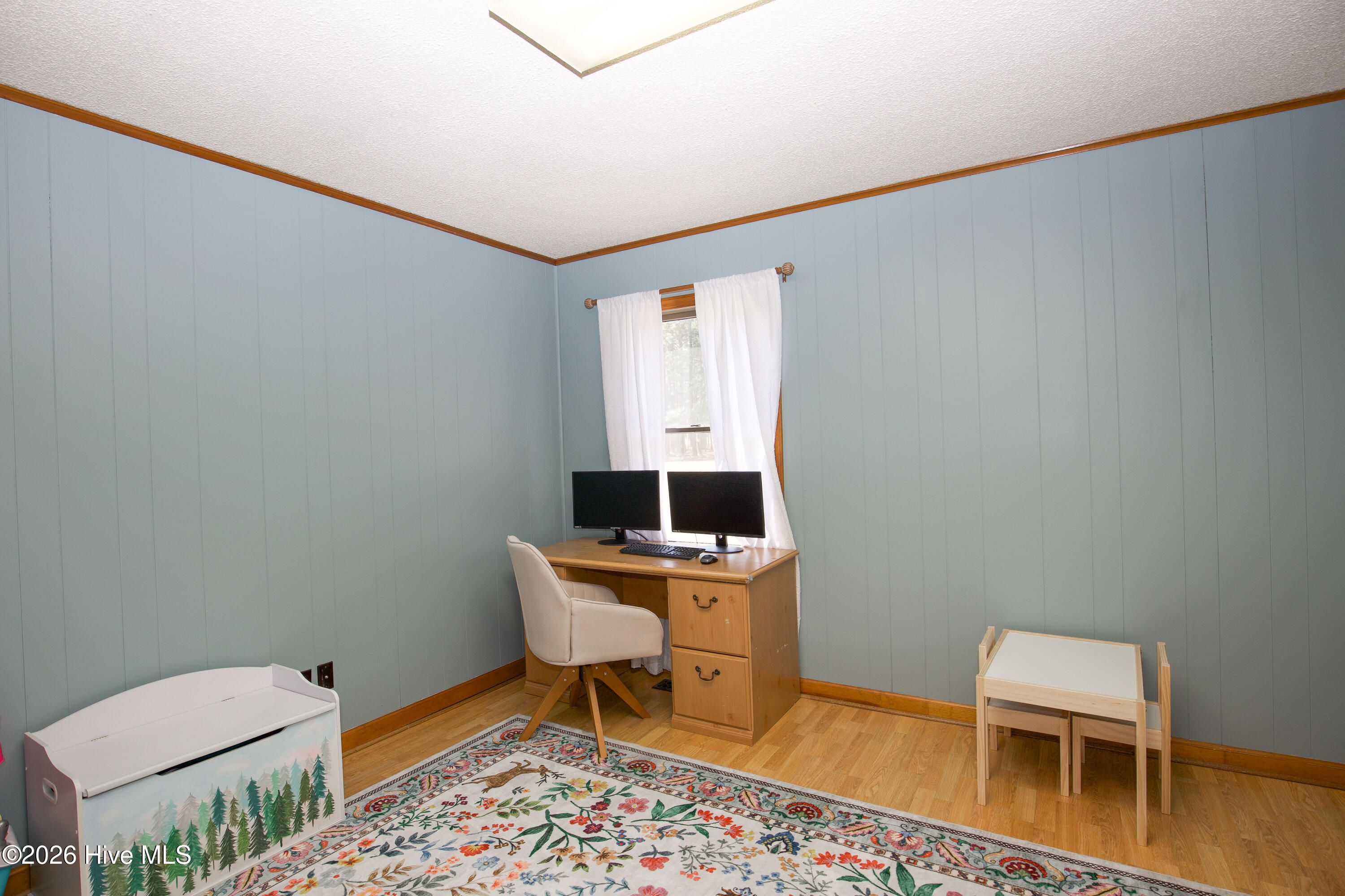 124 Joseph Road Aberdeen, NC 28315 - Photo 25 of 59 Alternate view of Bedroom #2 highlighting workspace potential and layout.