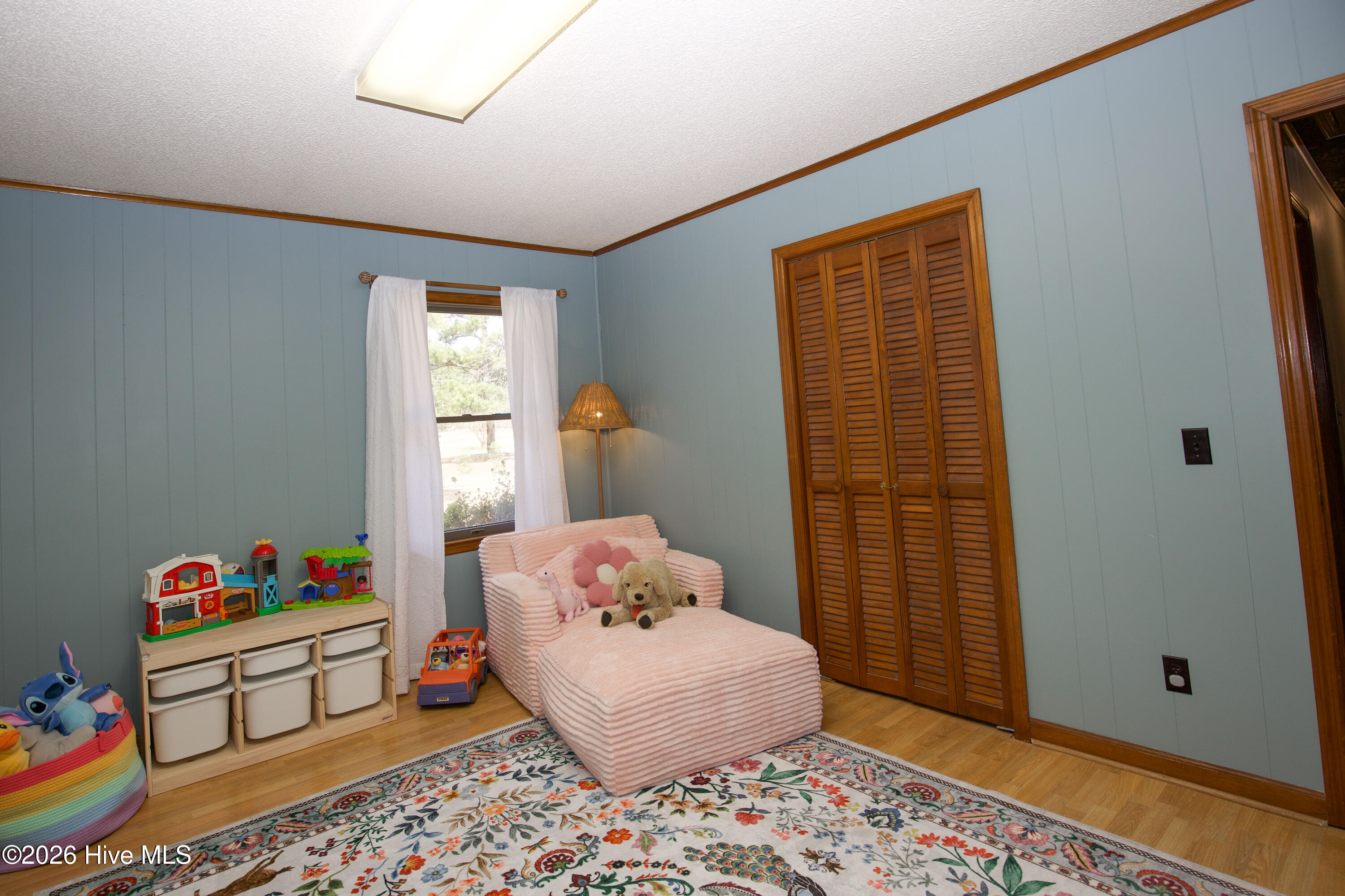 124 Joseph Road Aberdeen, NC 28315 - Photo 26 of 59 Bedroom #2 showcasing flexible layout for seating, play area, or multi-use space.
