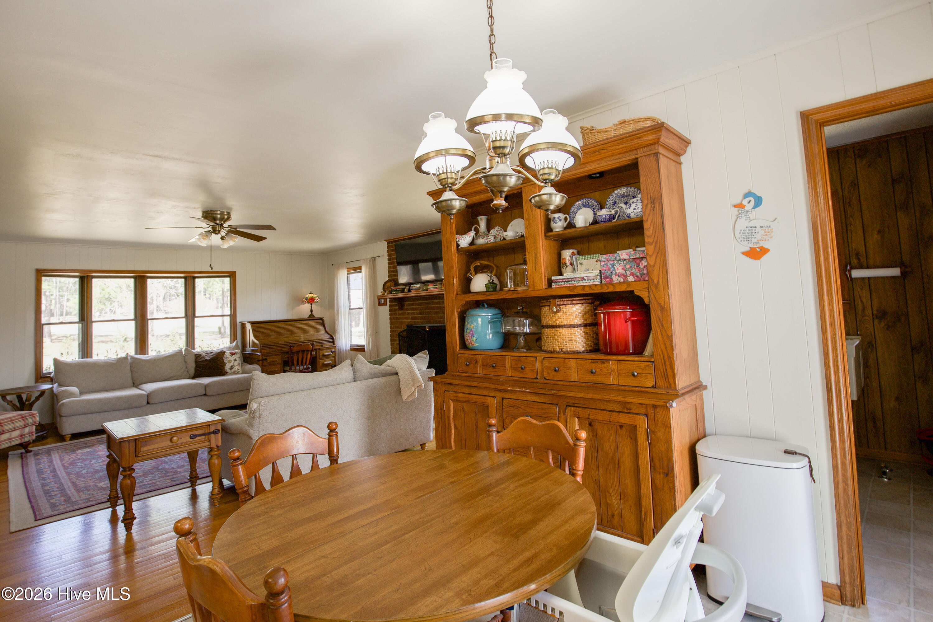 124 Joseph Road Aberdeen, NC 28315 - Photo 8 of 59 Dining area open to kitchen and living space, featuring natural light and convenient layout for everyday meals and gatherings.
