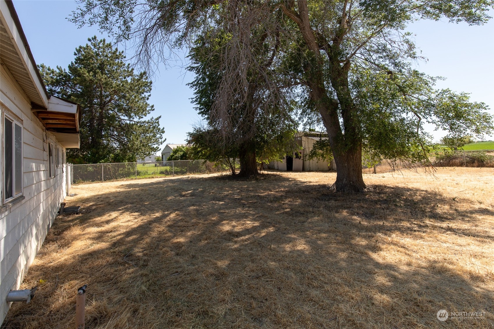 4838 Rd L.9 Northeast Moses Lake, WA 98837 - Photo 8 of 20 a view of outdoor space with deck and trees