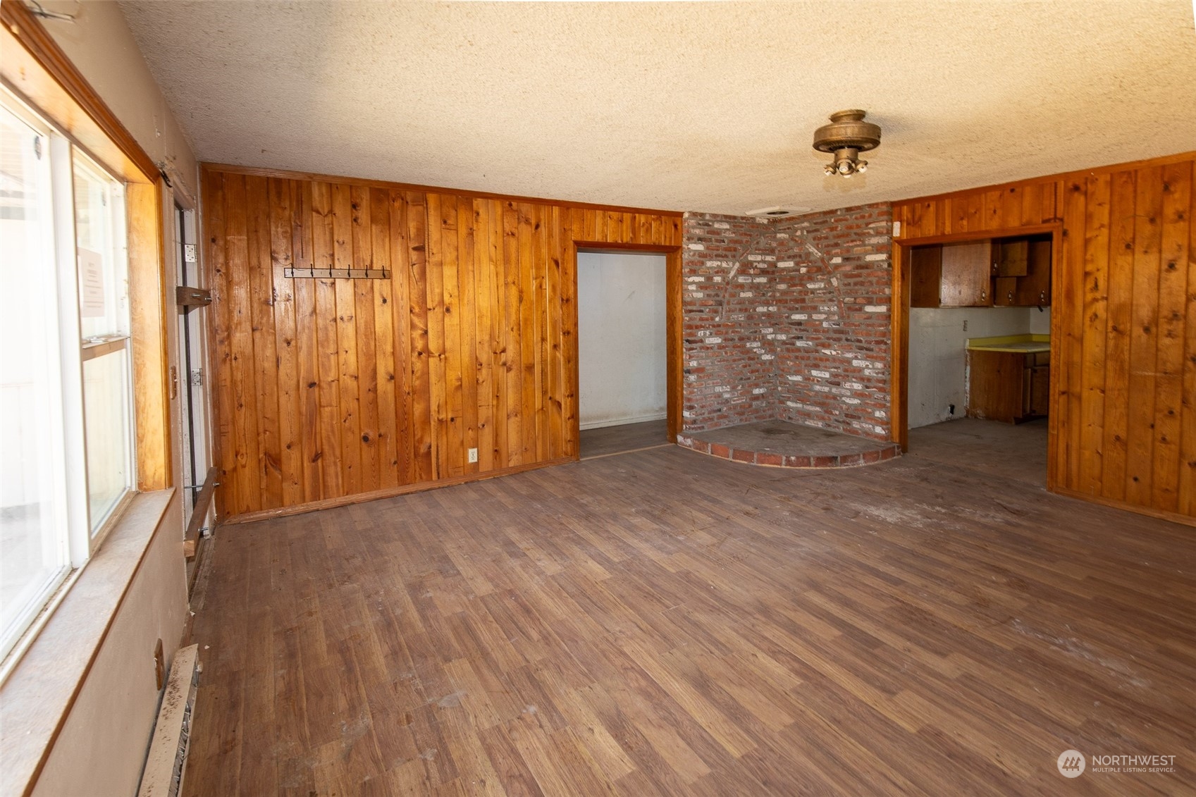 4838 Rd L.9 Northeast Moses Lake, WA 98837 - Photo 10 of 20 a view of empty room with wooden floor and fan