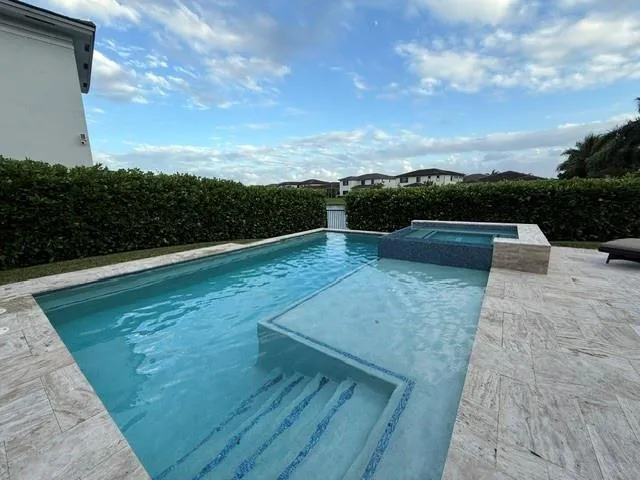 a view of outdoor space with swimming pool