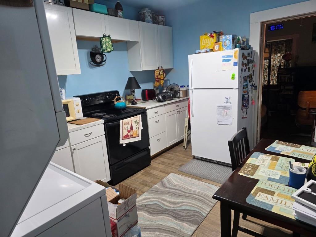3542 Wericoba Drive Macon, GA 31206 - Photo 13 of 21 a kitchen with a refrigerator and a stove top oven