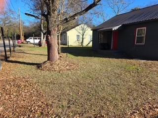 3542 Wericoba Drive Macon, GA 31206 - Photo 2 of 21 a front view of a house with a yard