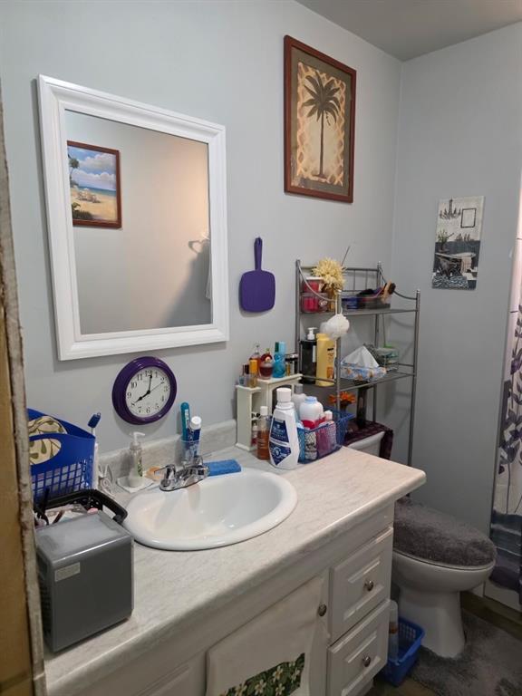 3542 Wericoba Drive Macon, GA 31206 - Photo 8 of 21 a bathroom with a sink mirror and vanity