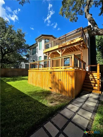 a view of a house with a swimming pool