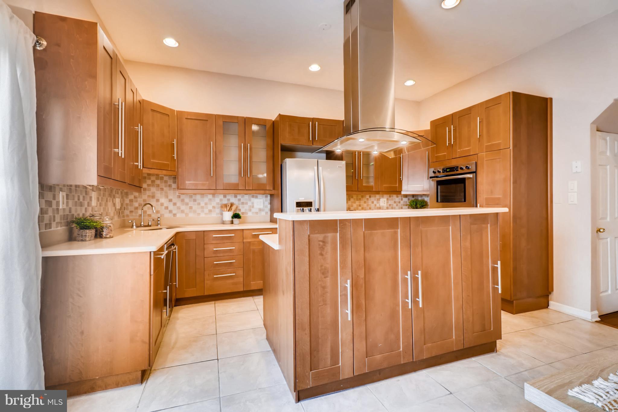 1812 North Calvert Street Baltimore, MD 21202 - Photo 7 of 17 Stainless Steel Appliances and Sleek Cabinets in K