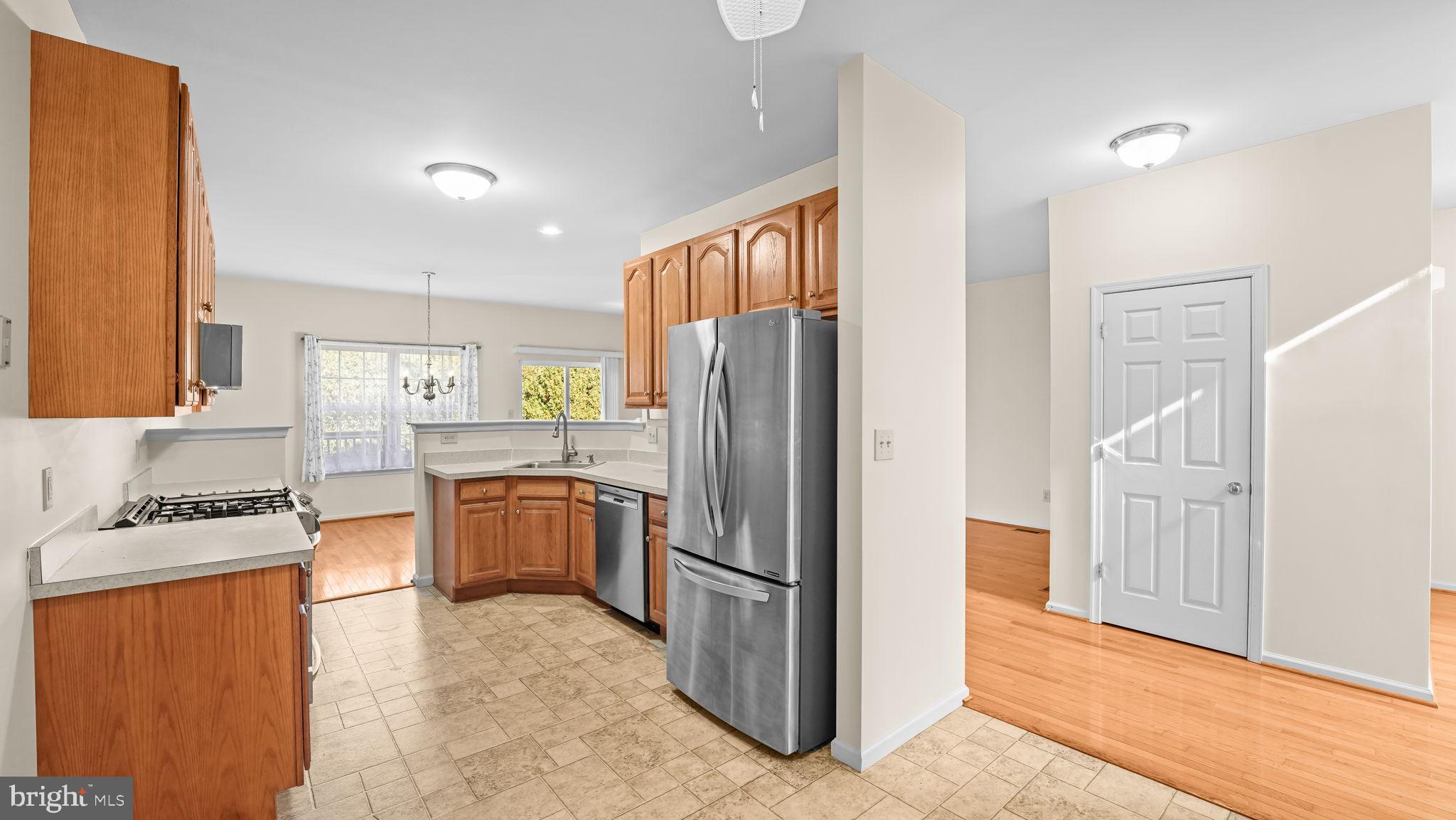 435 Buchanan Road Perkasie, PA 18944 - Photo 11 of 32 a kitchen with stainless steel appliances granite countertop a refrigerator stove and oven