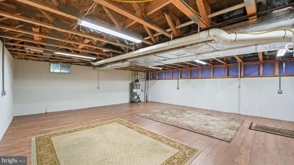 a view of a room with wooden ceiling