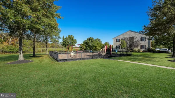 a view of a garden with houses