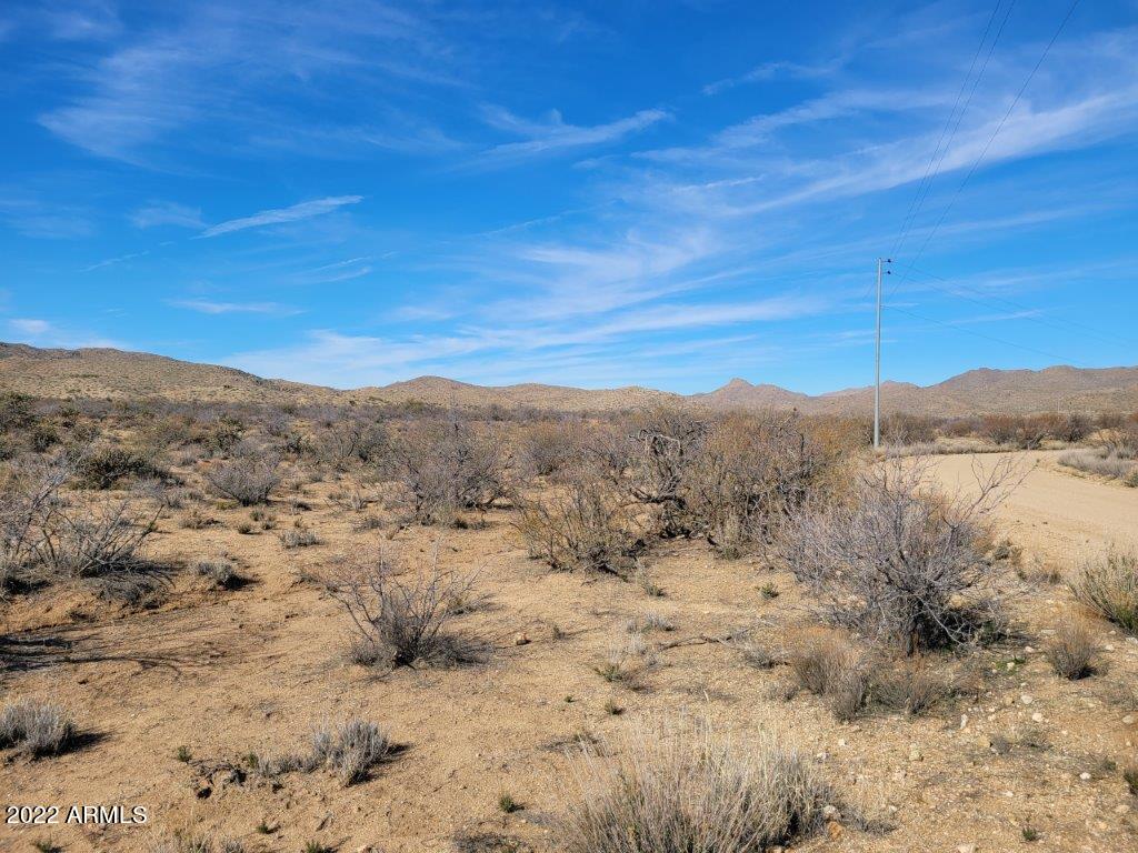 44 West Traveler Way, Unit 44 Congress, AZ 85332 - Photo 2 of 16 a view of a large body of water with a mountain in the background