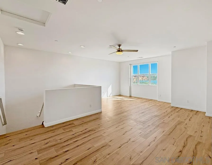 1395 Santa Diana Road, Unit 3 Chula Vista, CA 91913 - Photo 18 of 32 3rd floor loft. Great space for a game room, movie room, office, or 5th bedroom Has direct access to shared bathroom with 4th bedroom.