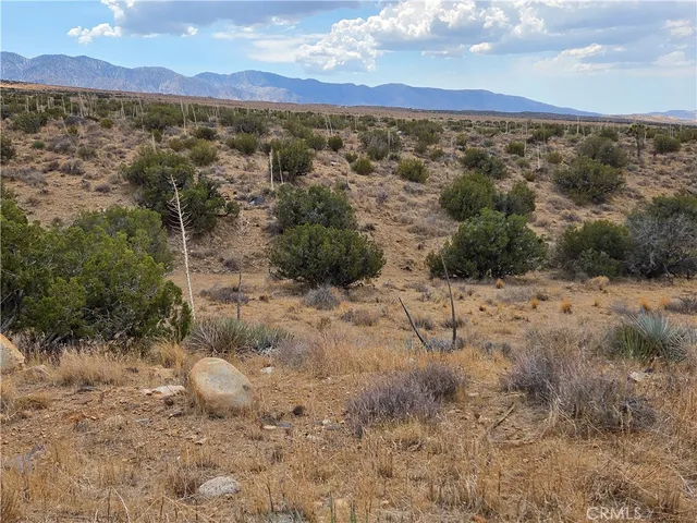 a view of an outdoor space with mountain view