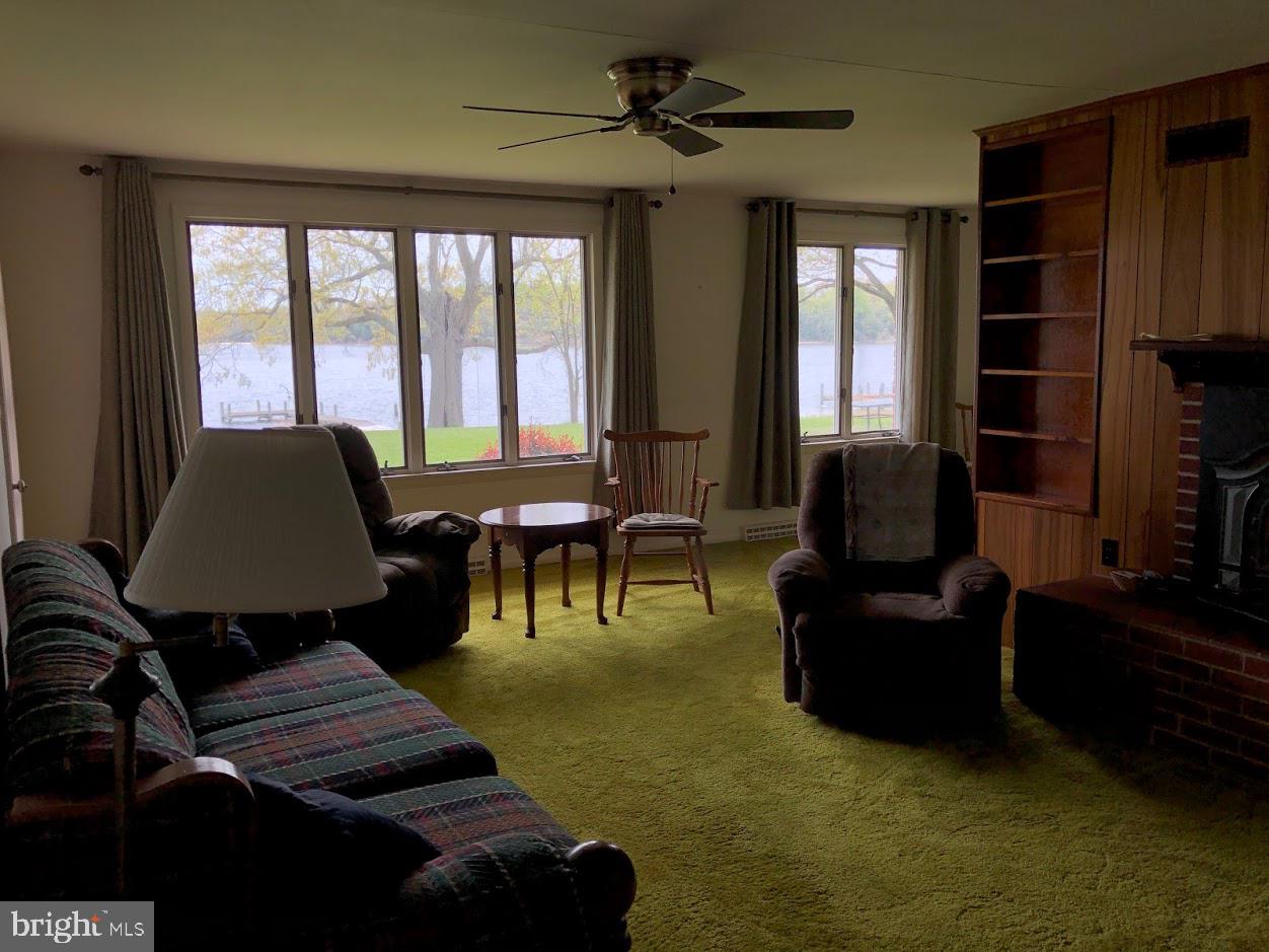 24644 Half Pone Point Road Hollywood, MD 20636 - Photo 22 of 29 Living room view out to the water