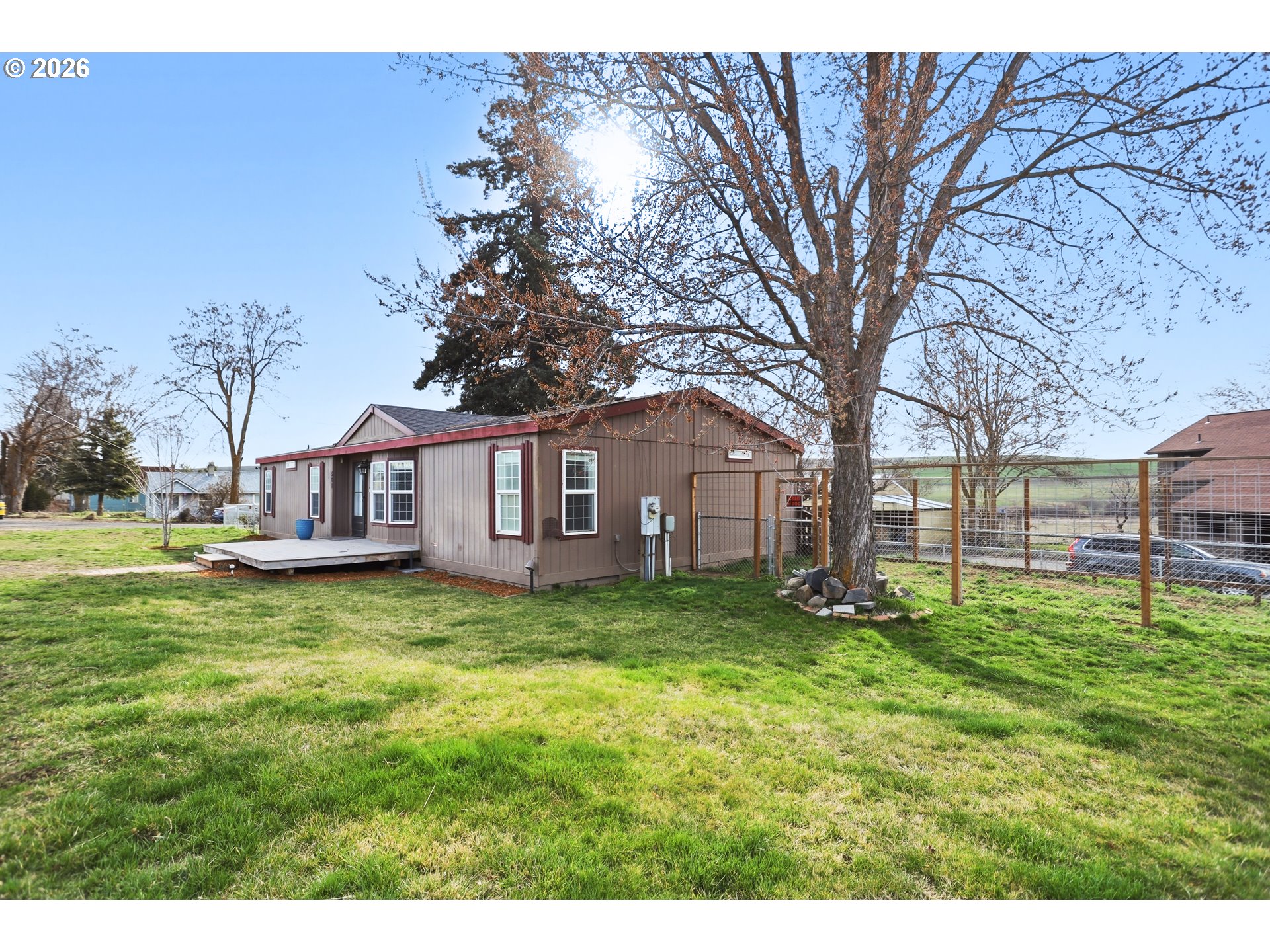 501 Northwest 3rd Street Dufur, OR 97021 - Photo 2 of 44 a view of a yard with a house