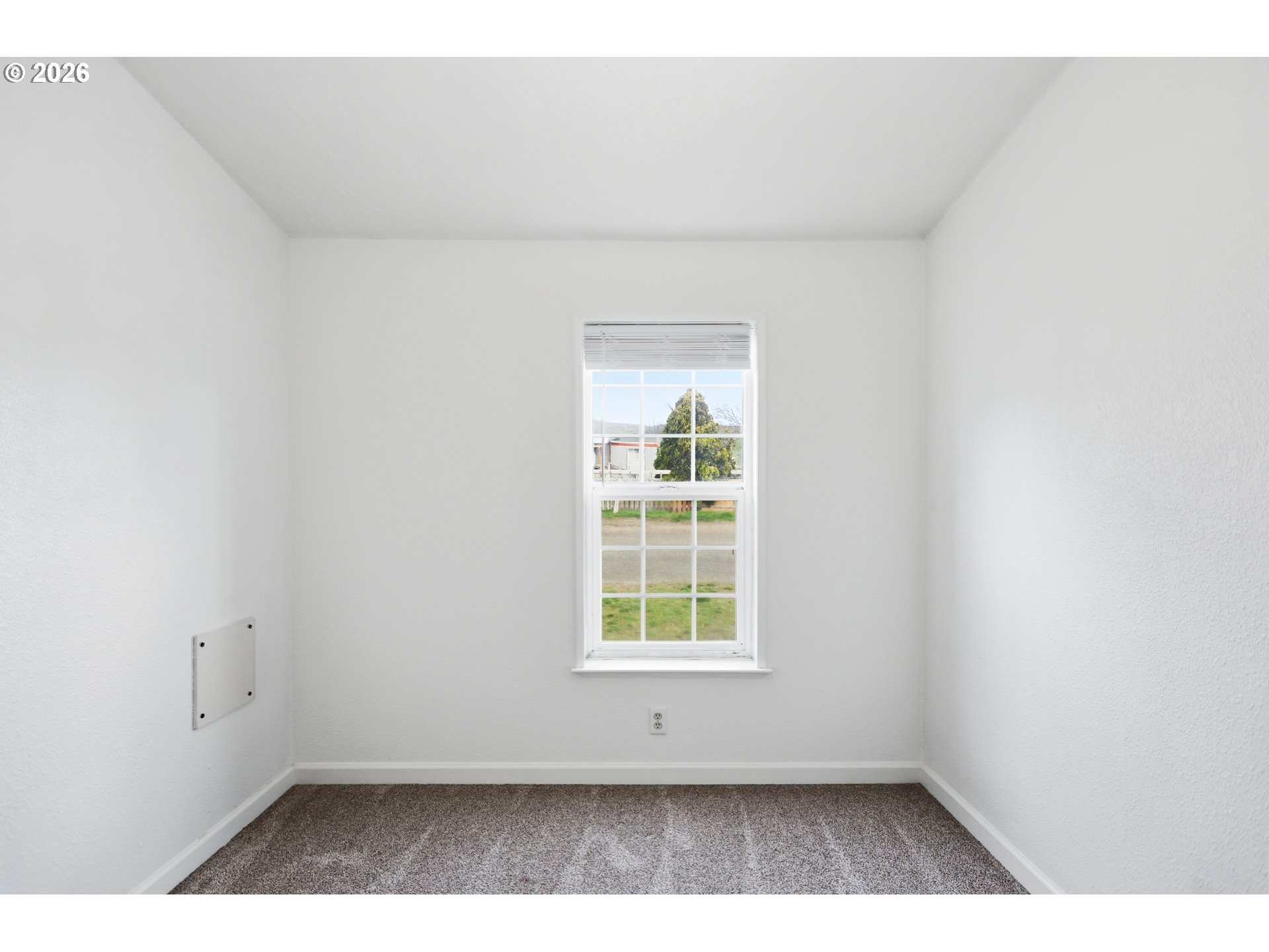 501 Northwest 3rd Street Dufur, OR 97021 - Photo 36 of 44 an empty room with a window