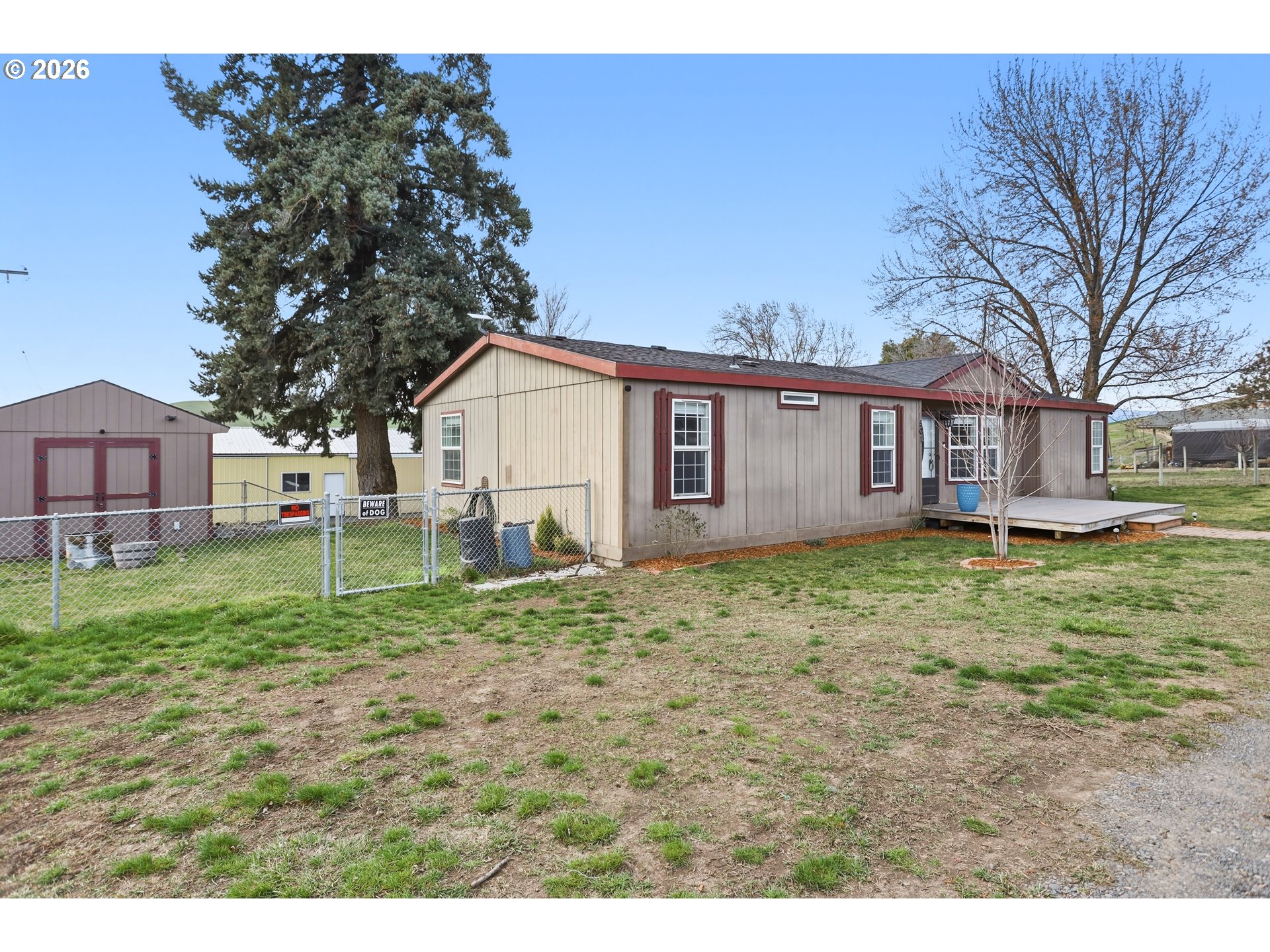 501 Northwest 3rd Street Dufur, OR 97021 - Photo 42 of 44 a view of a house with a yard