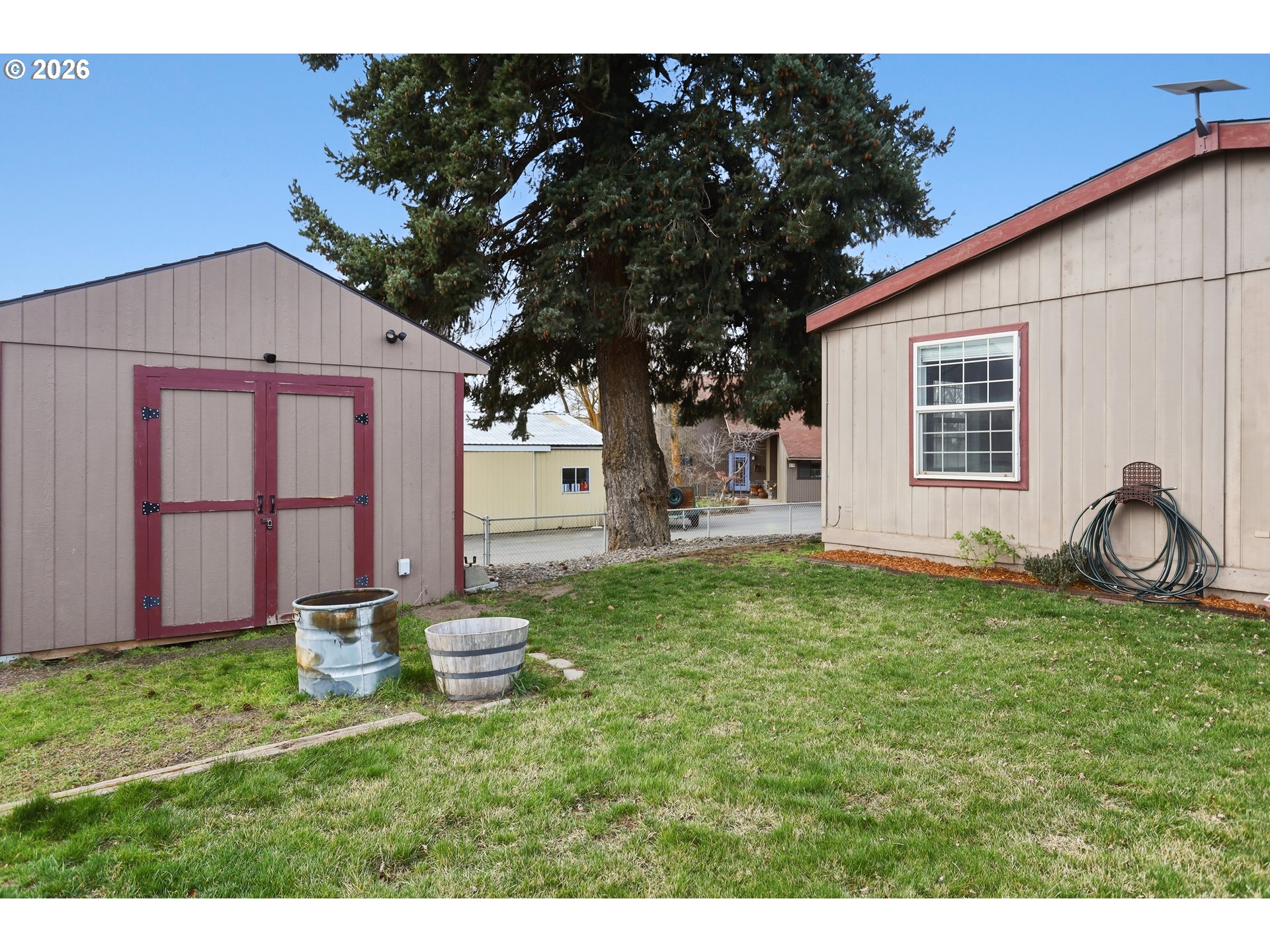 501 Northwest 3rd Street Dufur, OR 97021 - Photo 43 of 44 a house view with a backyard space