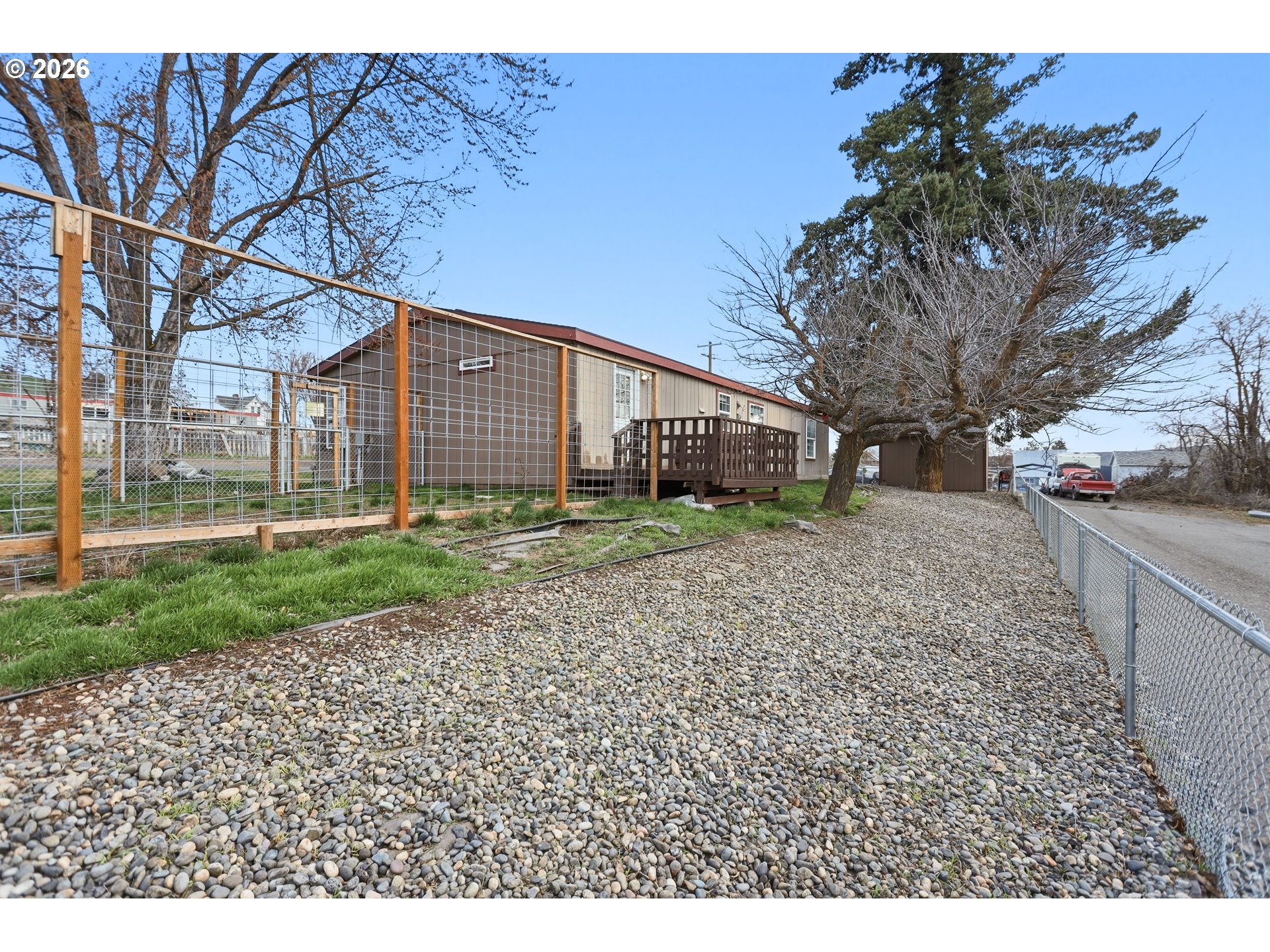501 Northwest 3rd Street Dufur, OR 97021 - Photo 5 of 44 a view of a house with a backyard
