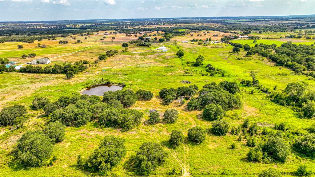 11500 Bowden Road Lipan, TX 76462 - Photo 16 of 32 Drone / aerial view with a water view