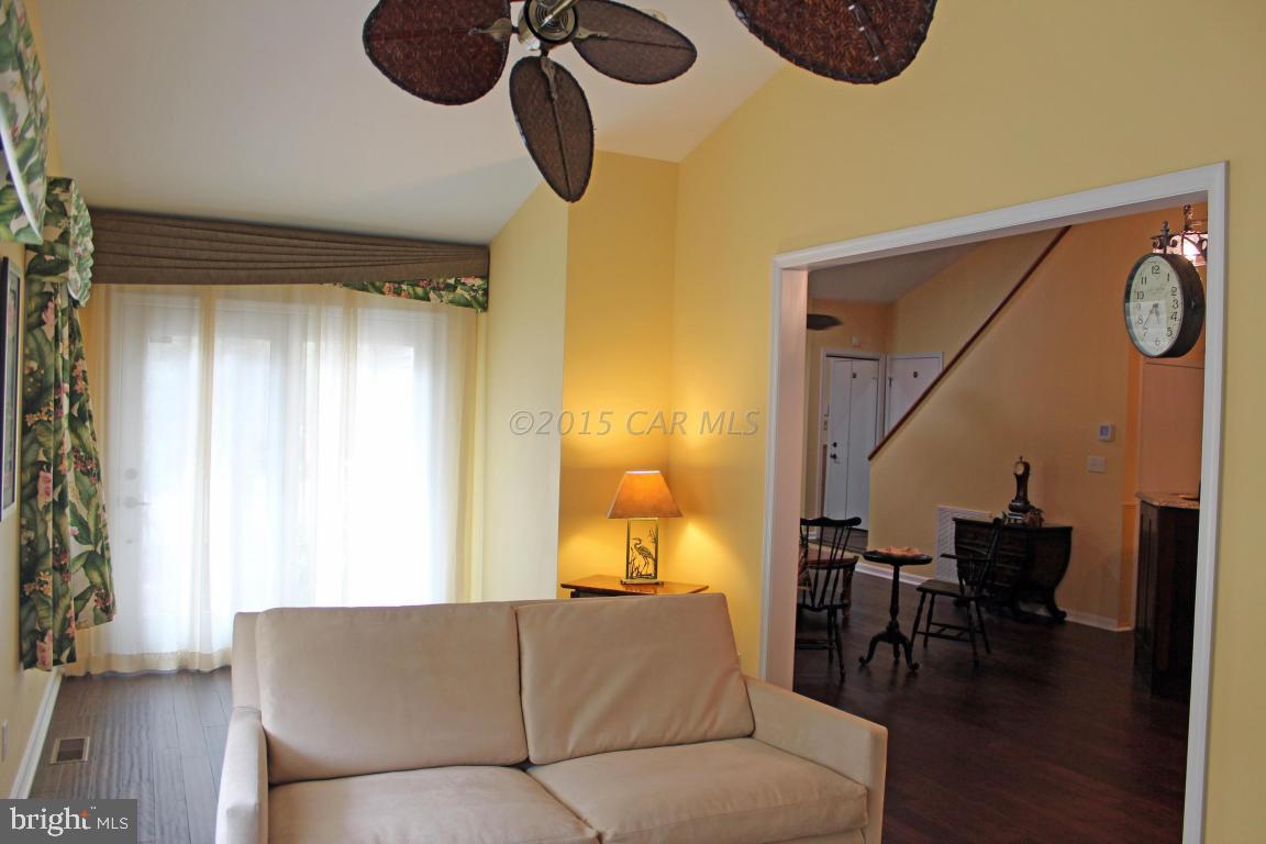 76 Pinehurst Road Ocean Pines, MD 21811 - Photo 14 of 23 a living room with furniture and a large window