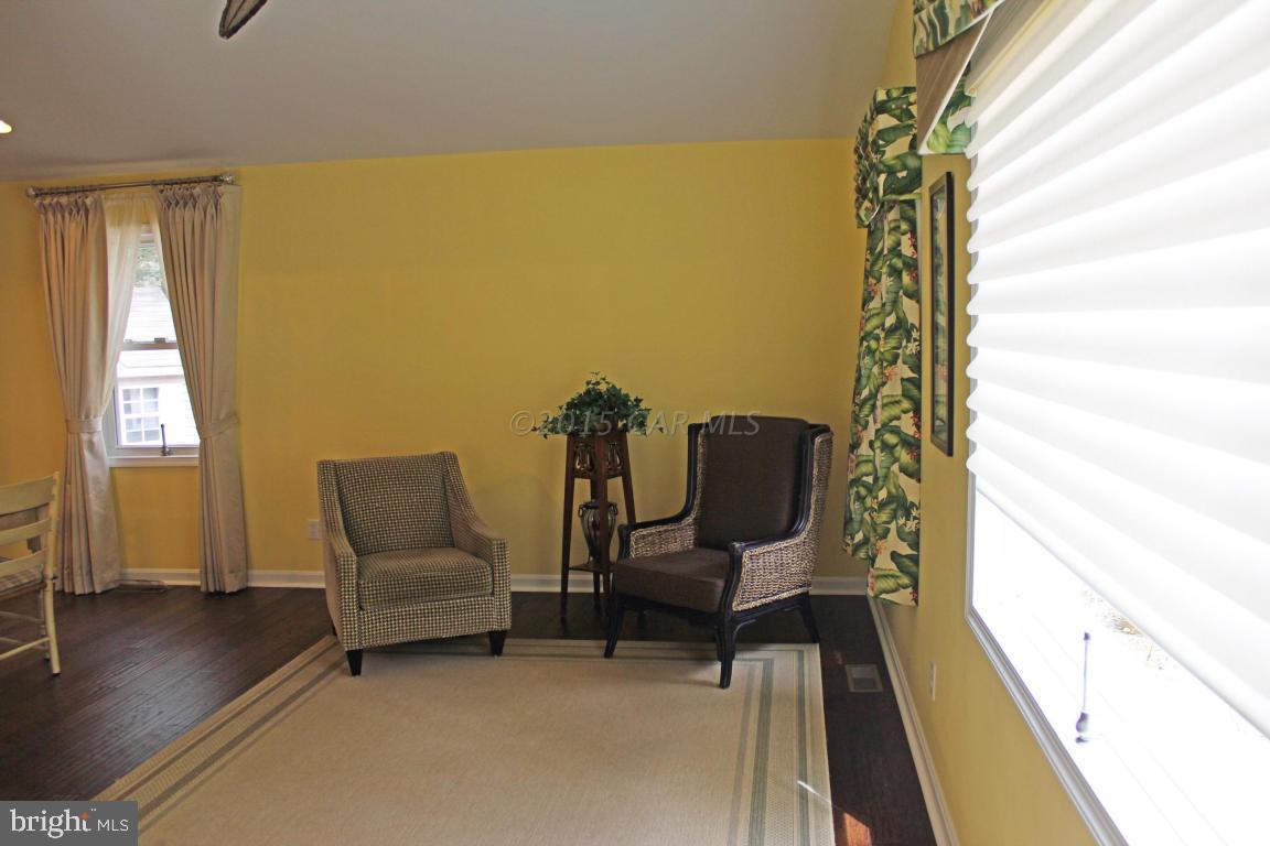 76 Pinehurst Road Ocean Pines, MD 21811 - Photo 15 of 23 a view of a workspace with furniture and a window