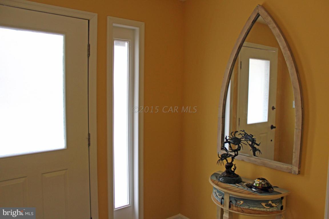 76 Pinehurst Road Ocean Pines, MD 21811 - Photo 20 of 23 a bathroom with a sink and a mirror