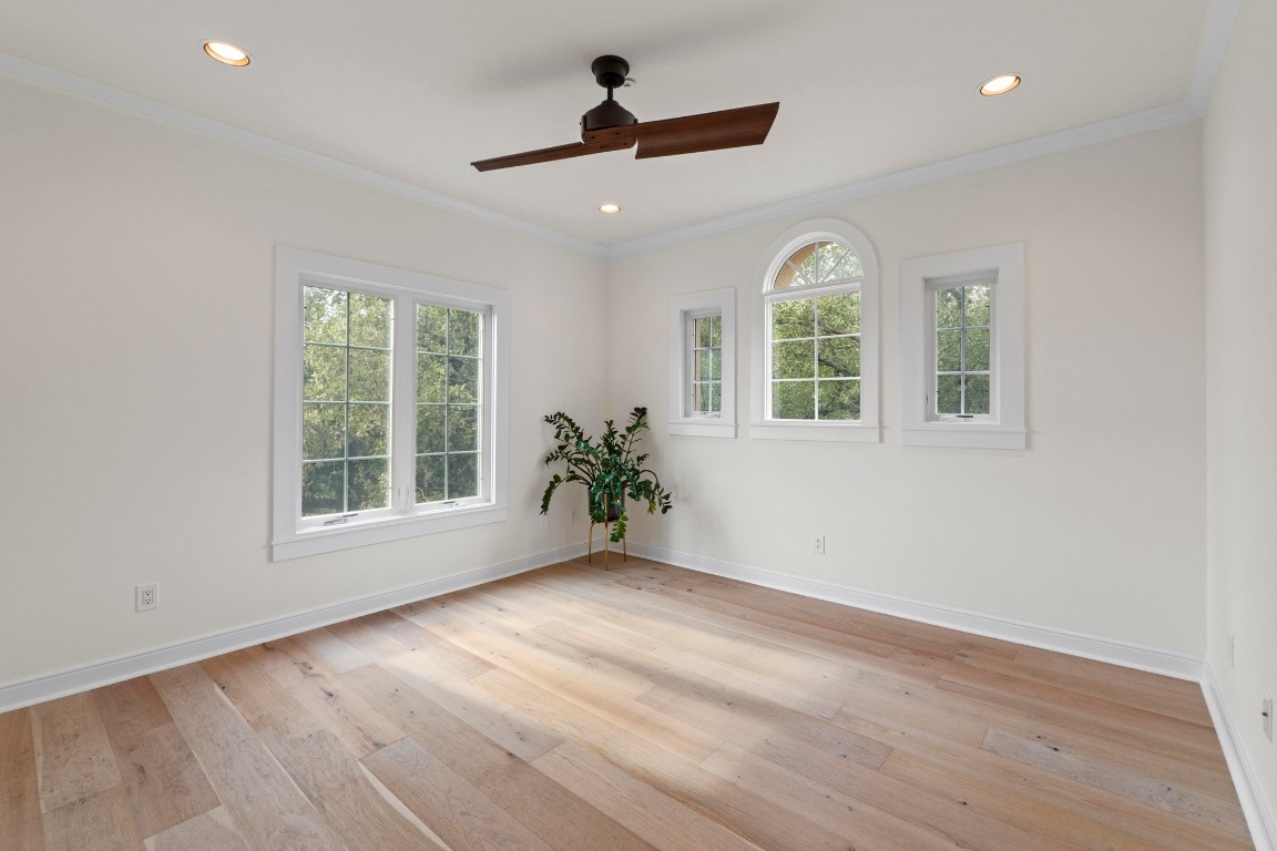 1937 Rue De St Tropez, Unit 5 Austin, TX 78746 - Photo 22 of 36 a view of an empty room with a window