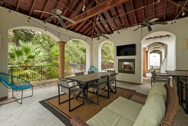 a view of a livingroom with furniture window and outside view