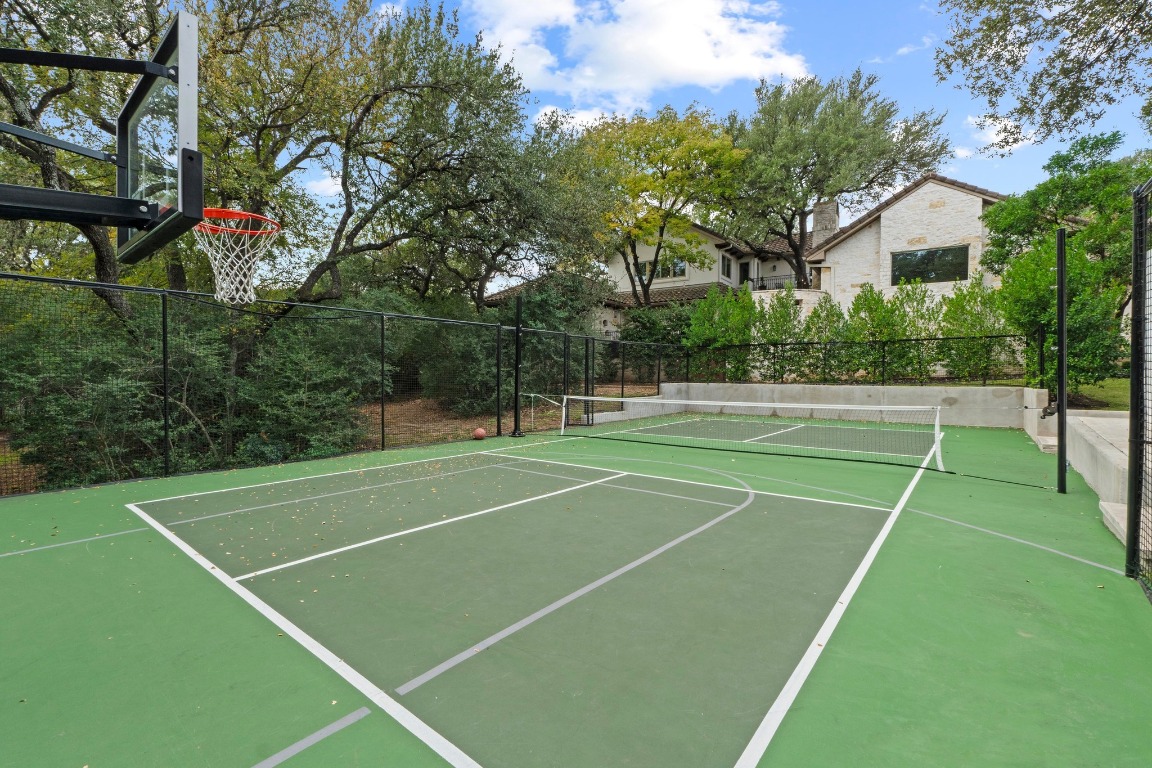 1937 Rue De St Tropez, Unit 5 Austin, TX 78746 - Photo 35 of 36 a view of a tennis court