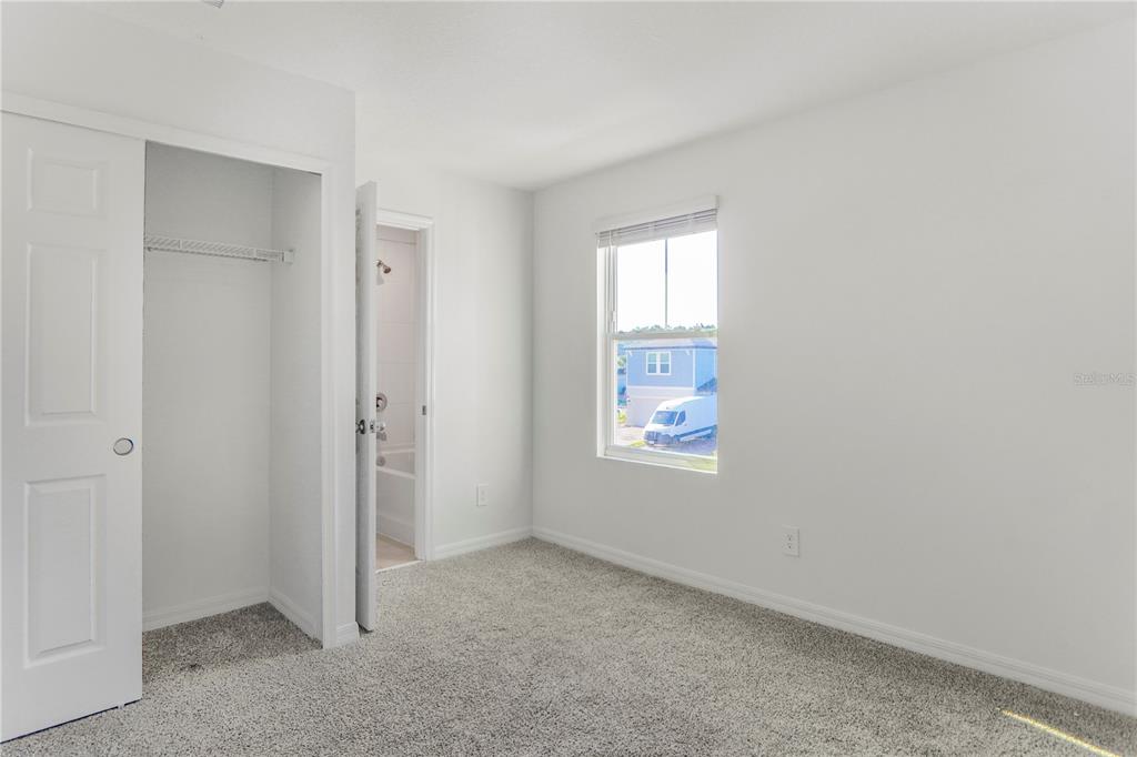 4319 Ranch House Road St. Cloud, FL 34772 - Photo 17 of 47 a view of an empty room with window