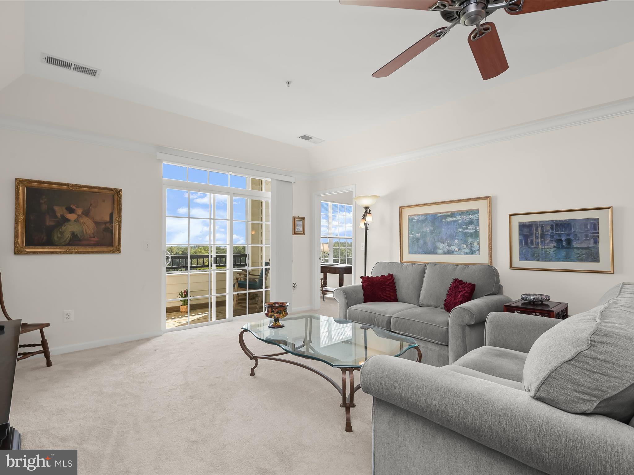 7325 Brookview Road, Unit 305 Elkridge, MD 21075 - Photo 12 of 40 a living room with furniture and a window