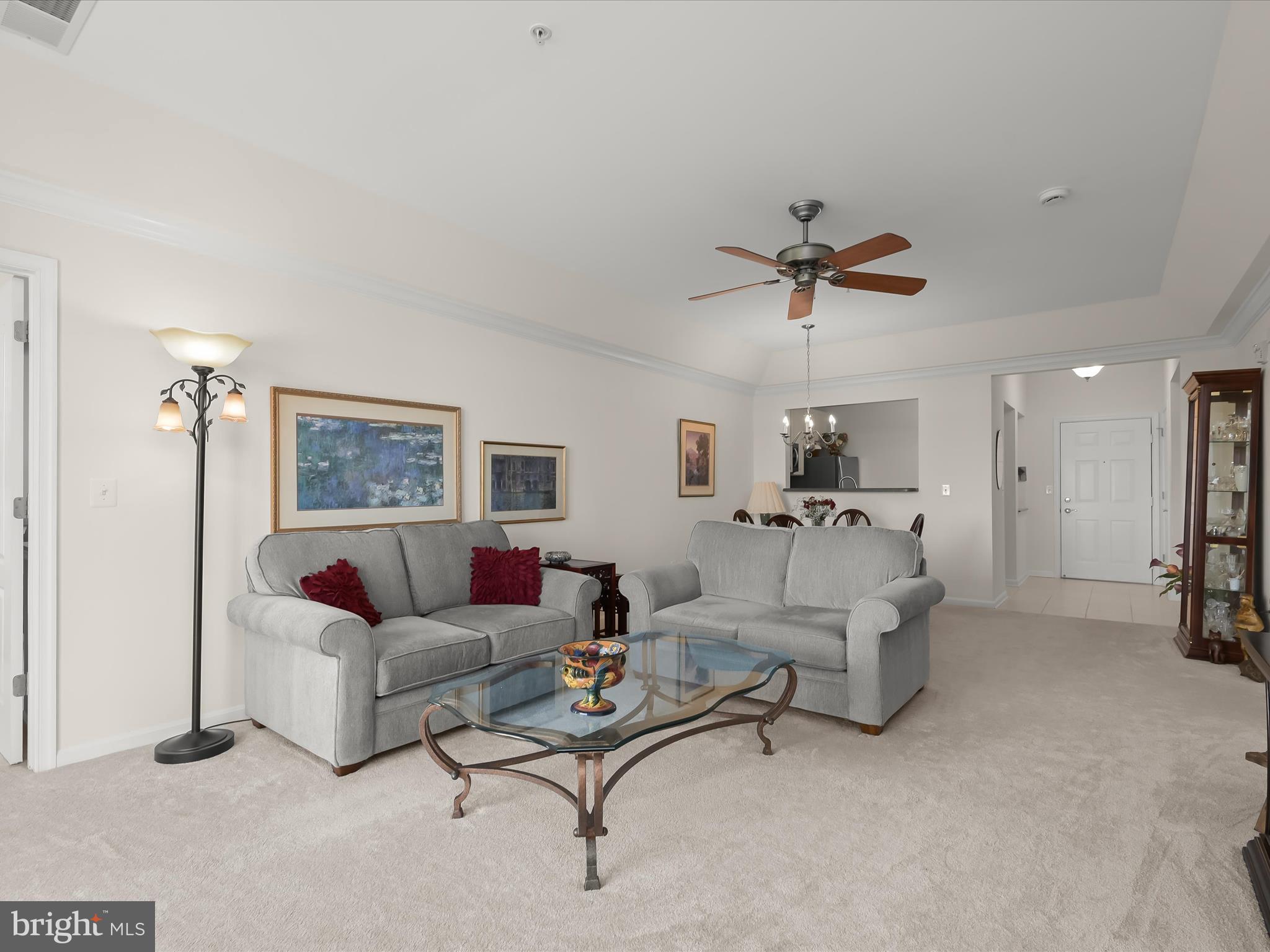 7325 Brookview Road, Unit 305 Elkridge, MD 21075 - Photo 14 of 40 a living room with furniture and a ceiling fan