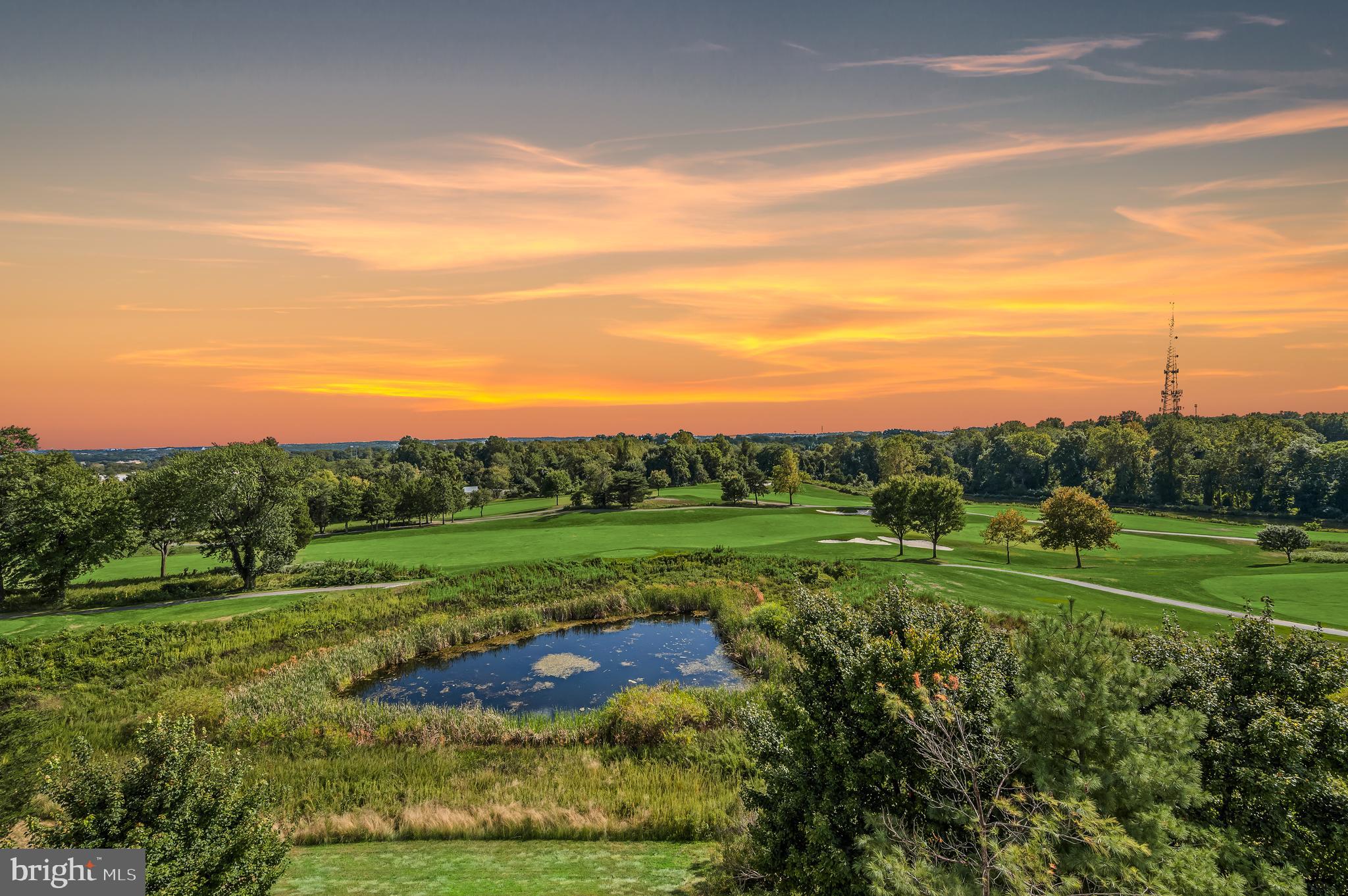 7325 Brookview Road, Unit 305 Elkridge, MD 21075 - Photo 17 of 40 a view of a grassy field with trees