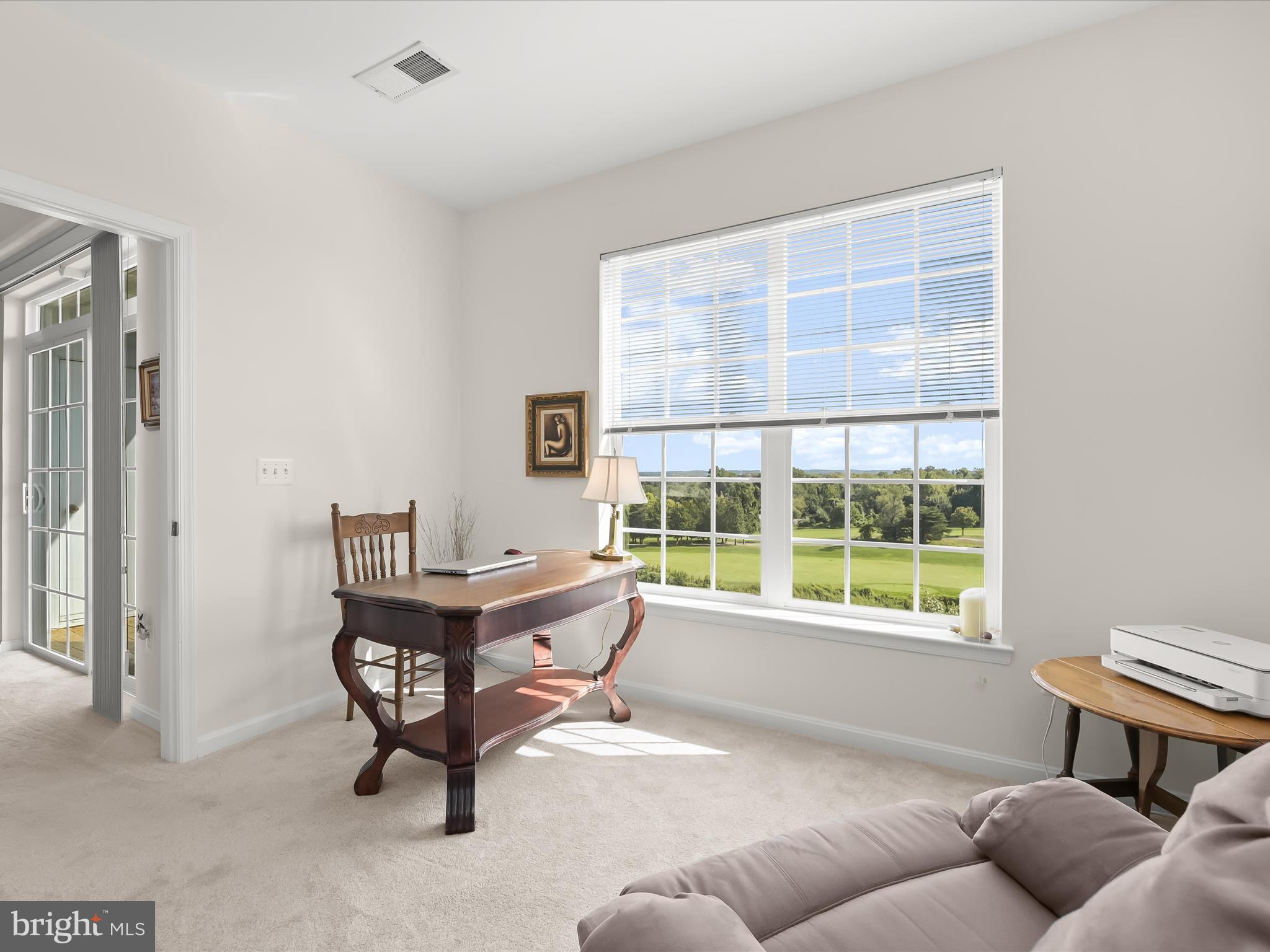 7325 Brookview Road, Unit 305 Elkridge, MD 21075 - Photo 20 of 40 a living room with furniture and a window