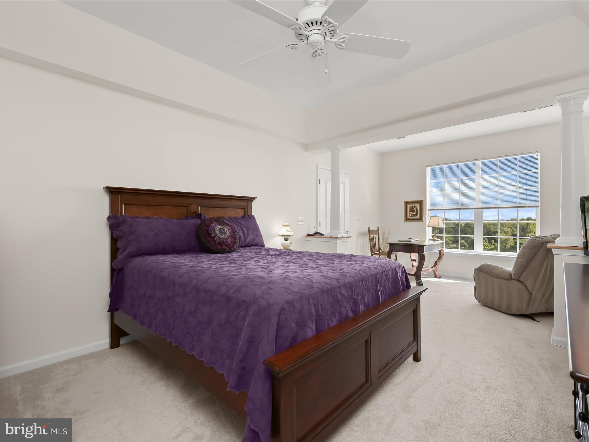 7325 Brookview Road, Unit 305 Elkridge, MD 21075 - Photo 23 of 40 a bedroom with a bed and large window