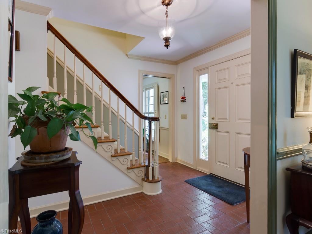 7103 Haw Ridge Road Summerfield, NC 27358 - Photo 2 of 30 Inviting Foyer with crown molding.