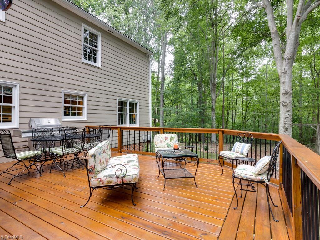 7103 Haw Ridge Road Summerfield, NC 27358 - Photo 30 of 30 Large deck for entertaining.