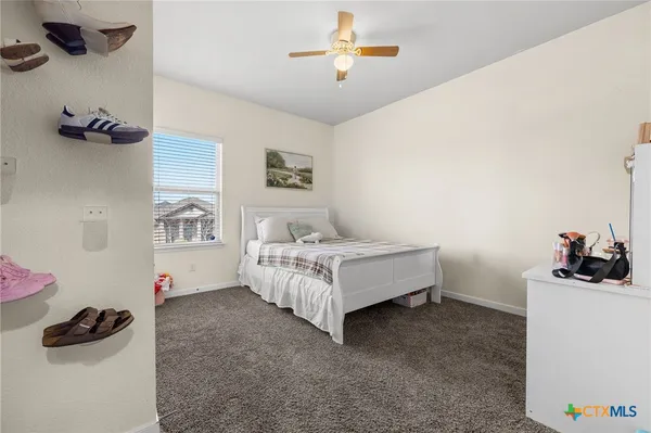 a bed room with a bed and a couch