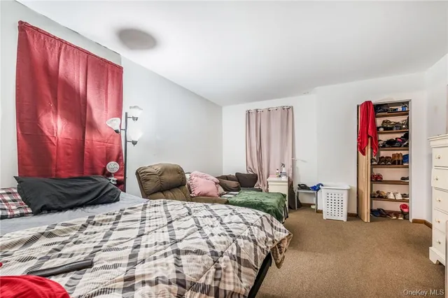 a bedroom with a bed and furniture