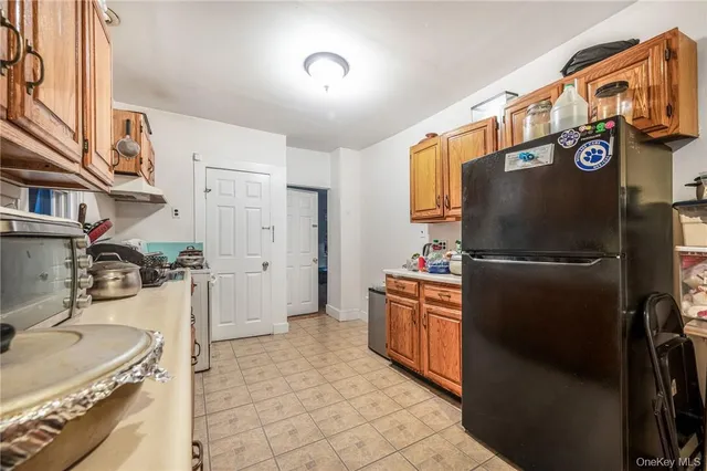 a view of a couch in wooden floor