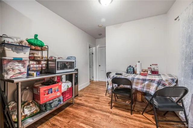 a bedroom with a bed and dresser