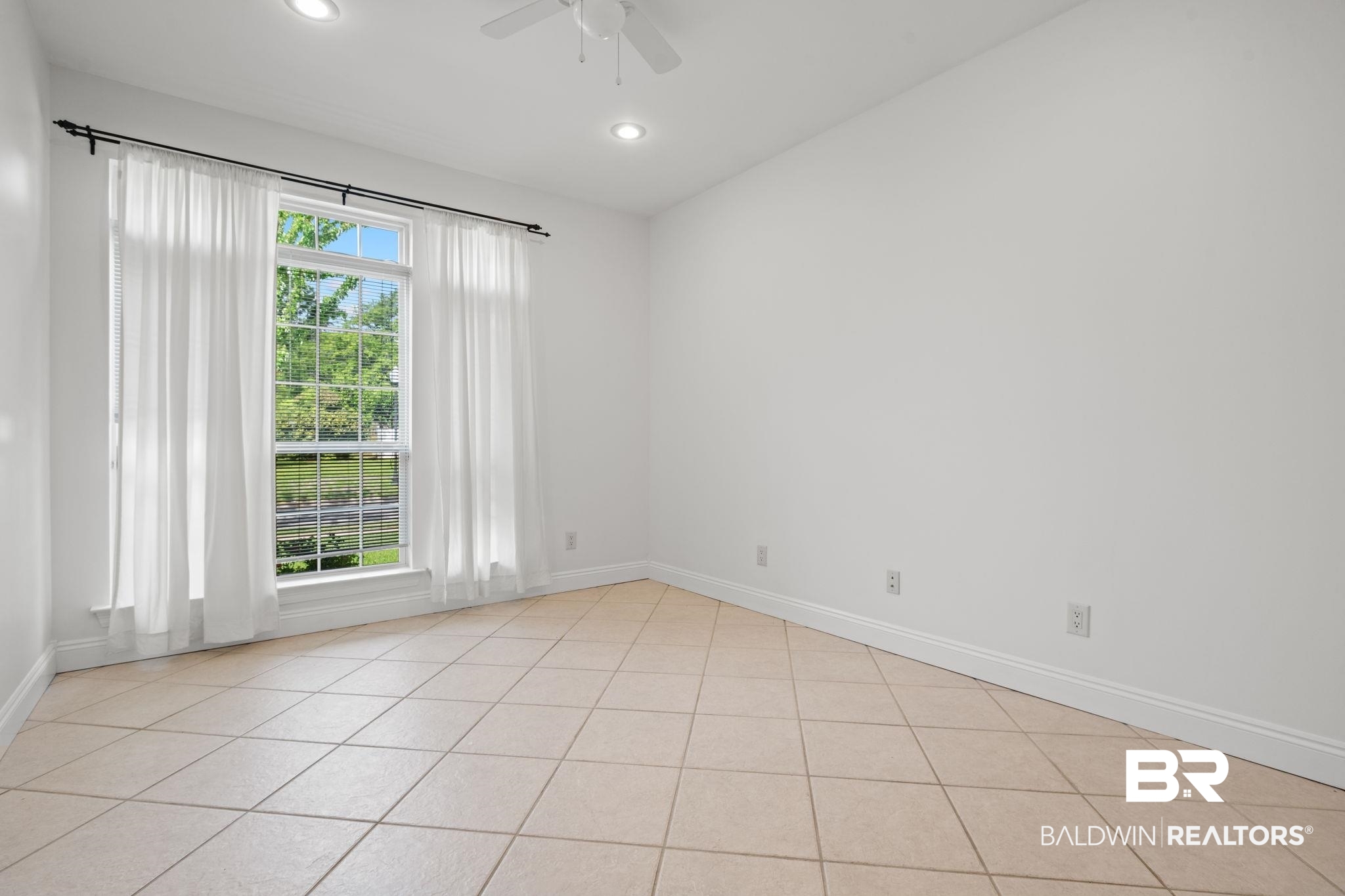 29634 St George Street Daphne, AL 36526 - Photo 28 of 47 Empty room with recessed lighting, ceiling fan, and light tile patterned flooring