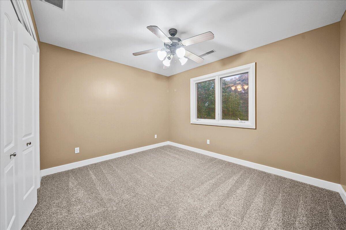 8751 Bridgewater Court Crown Point, IN 46307 - Photo 39 of 49 a view of an empty room with a window