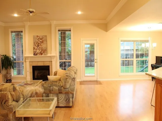 a bed room with a bed and a large window