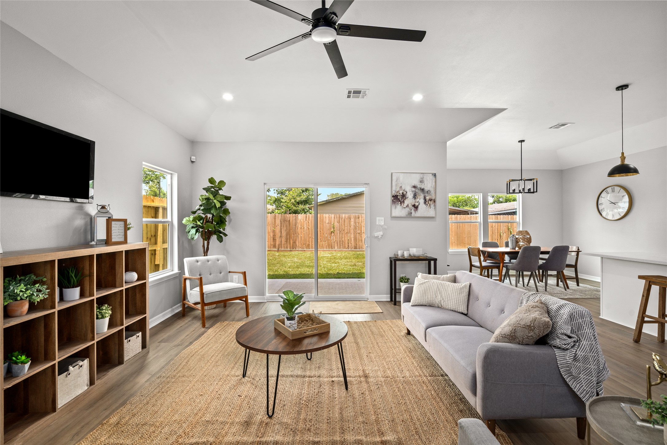14307 Laredo Street Houston, TX 77015 - Photo 10 of 38 a living room with furniture and a flat screen tv