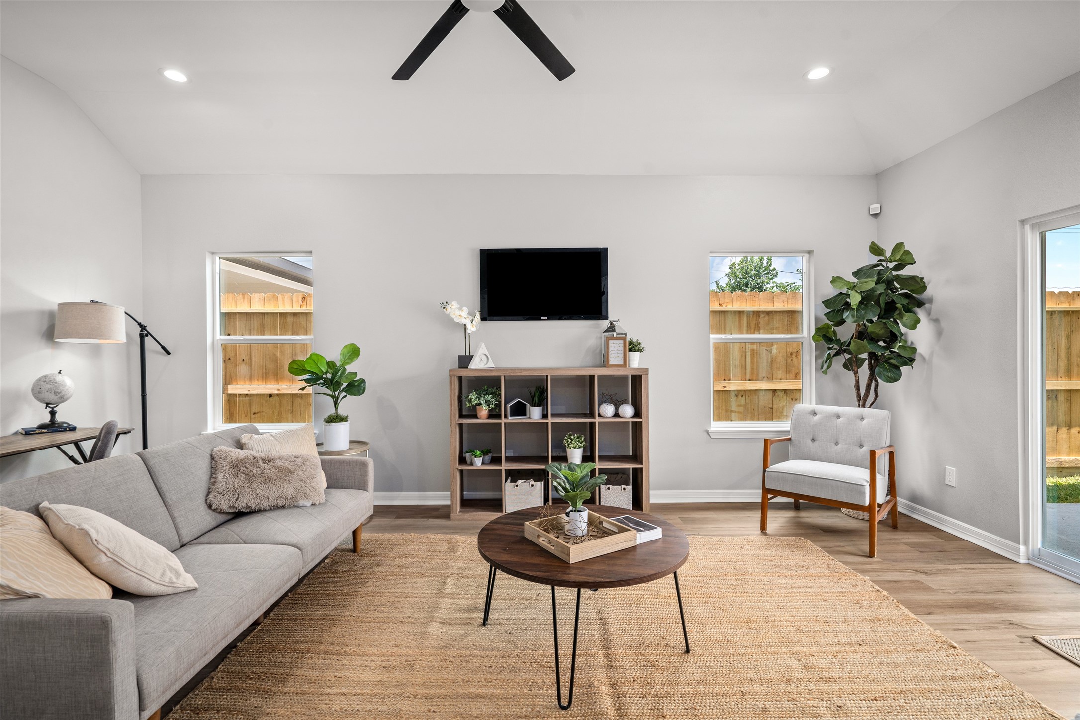 14307 Laredo Street Houston, TX 77015 - Photo 14 of 38 a living room with furniture and a flat screen tv