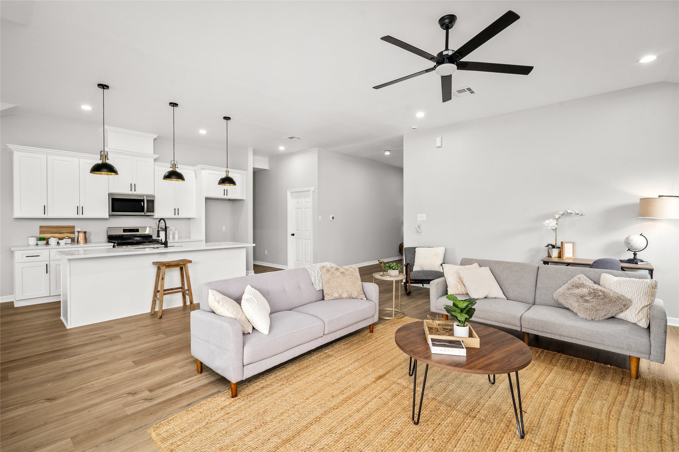 14307 Laredo Street Houston, TX 77015 - Photo 16 of 38 a living room with furniture and kitchen view